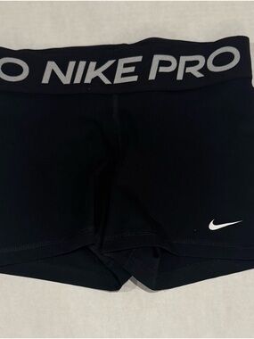 Nike Black Athletic Compression Shorts with White Swoosh